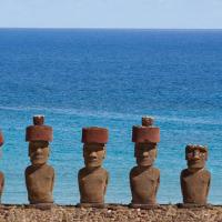 Anakena has two Ahu one with a single Moai and the other with si